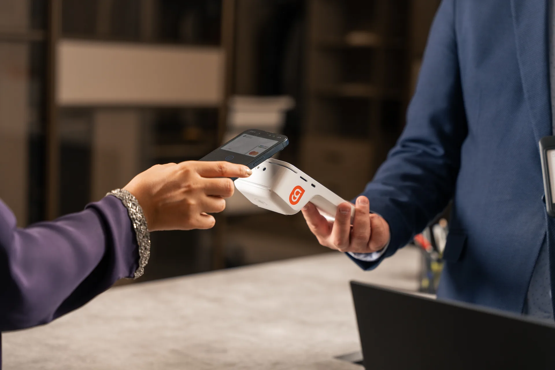 A customer checking a loyalty program on their phone